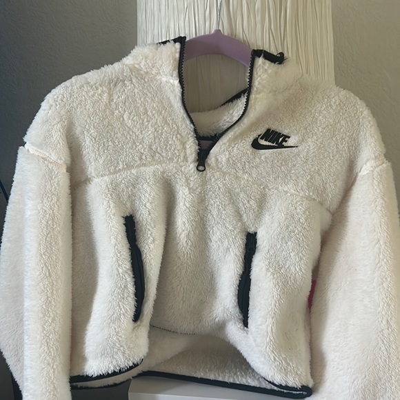 https://poshmark.com/listing/white-nike-fuzzy-pull-over-6510a58304166da49ef17310
